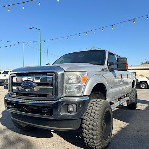 2015 F-250 Gray Diesel, lifted. Driver side angle